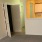a living rooms with doors and a carpet